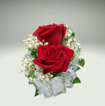 "double red rose corsage"